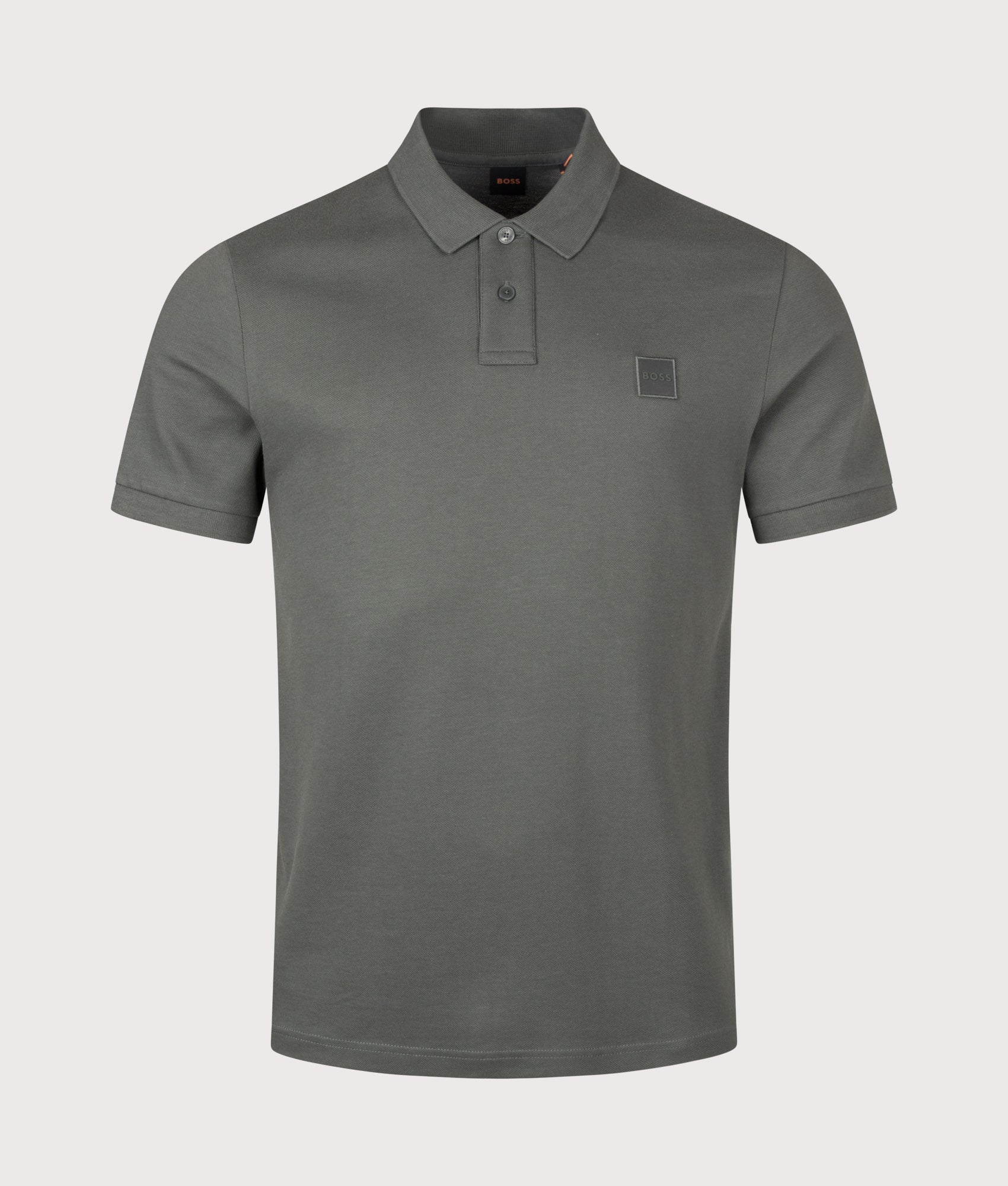 BOSS Slim Fit Passenger Polo Shirt in Open Green at EQVVS Menswear. Front shot.