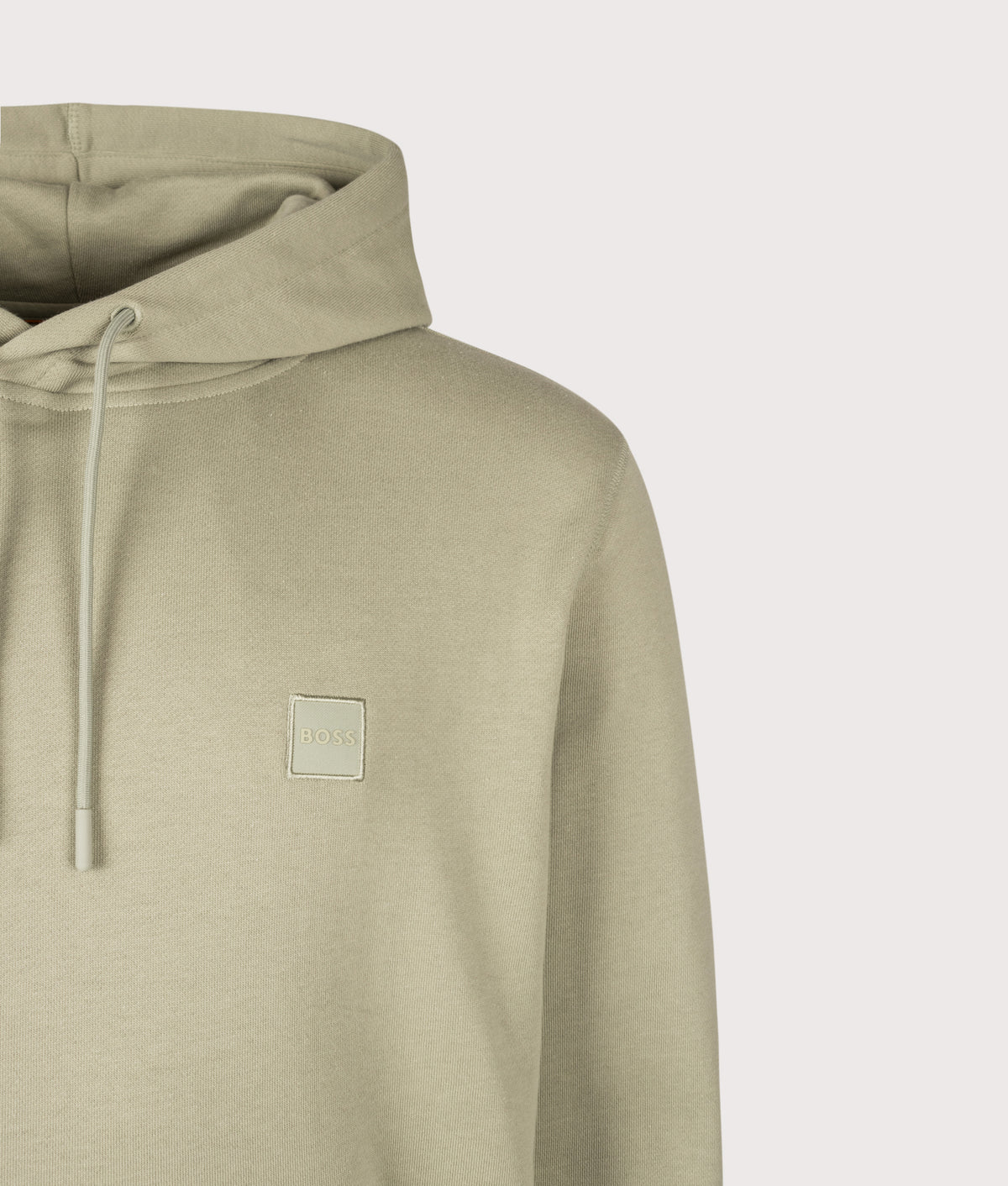 BOSS Regular Fit Wetalk Hoodie in Open Green at EQVVS Menswear. Detail shot.