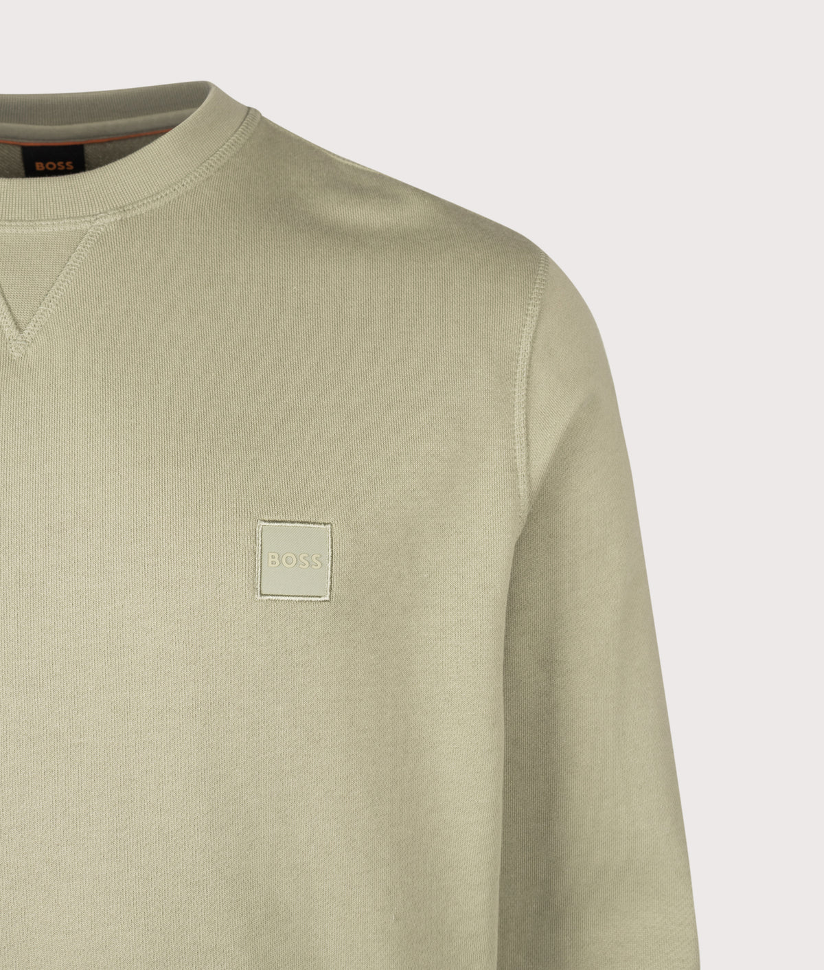 BOSS Regular Fit Westart Sweatshirt in Open Green at EQVVS Menswear. Detail shot.