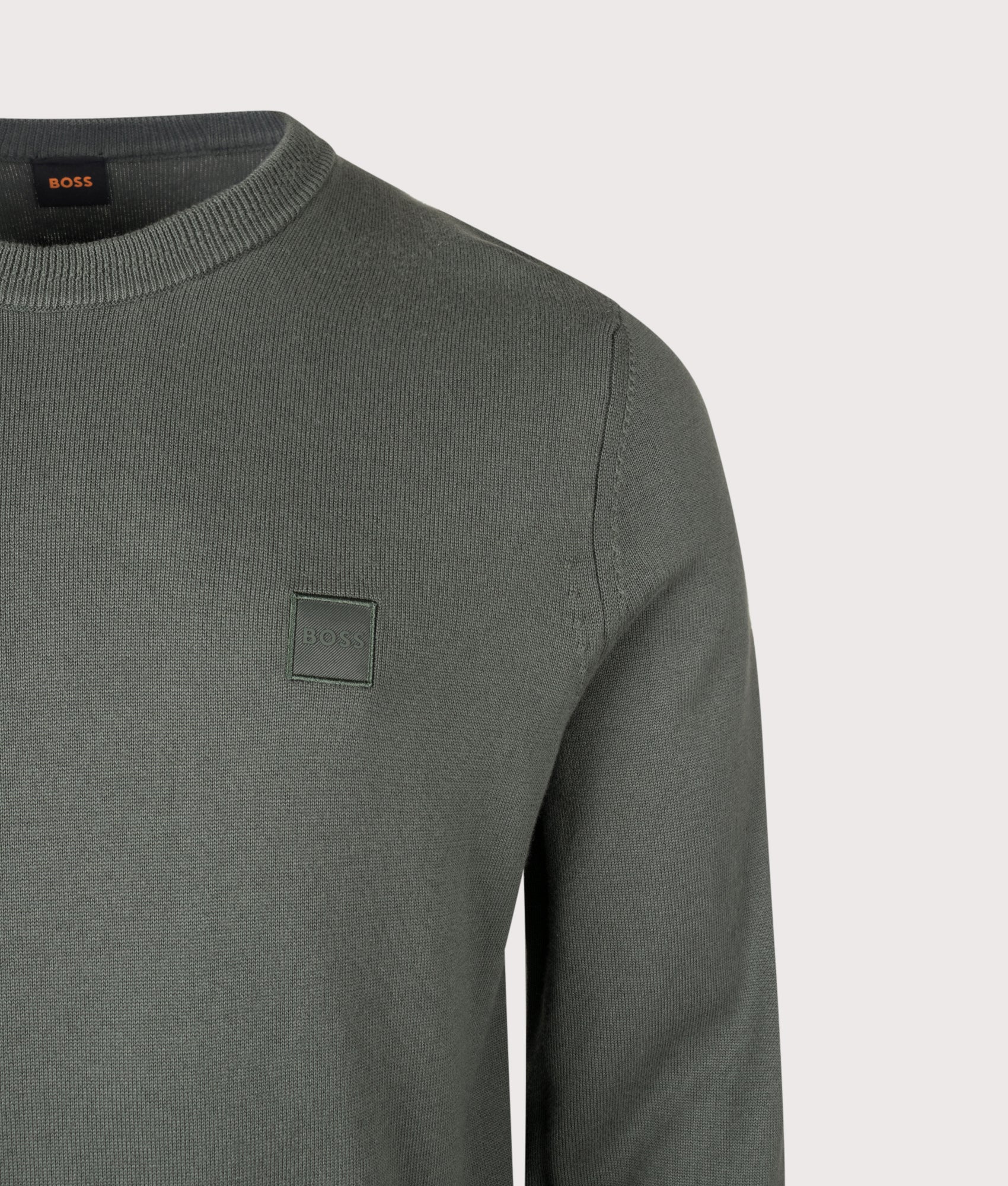 BOSS Regular Fit Kanovano Knitted Jumper in Open Green at EQVVS Menswear. Detail shot.