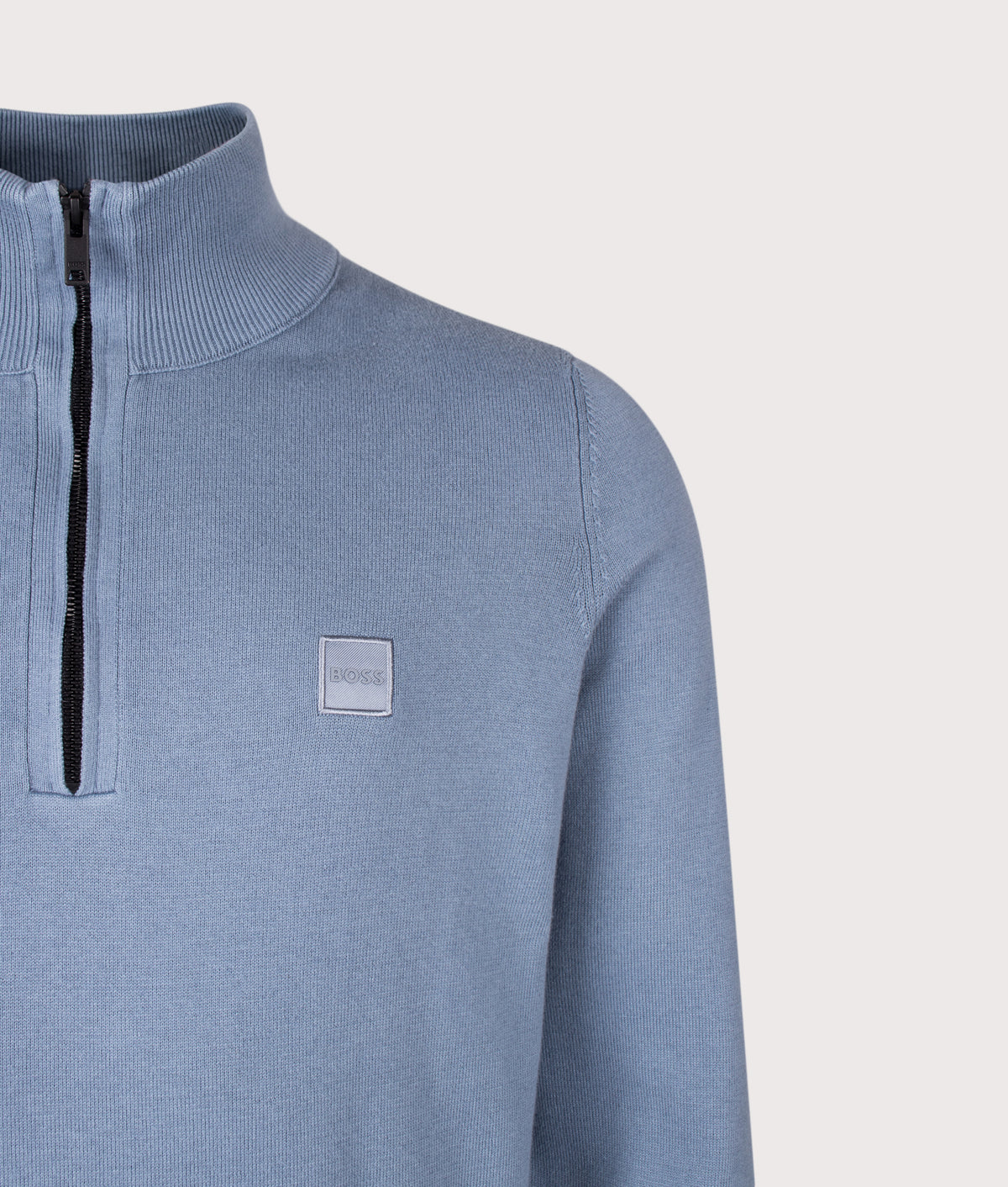 BOSS Regular Fit Kanobix Quarter Zip Jumper in Medium Blue at EQVVS Menswear. Detail shot.