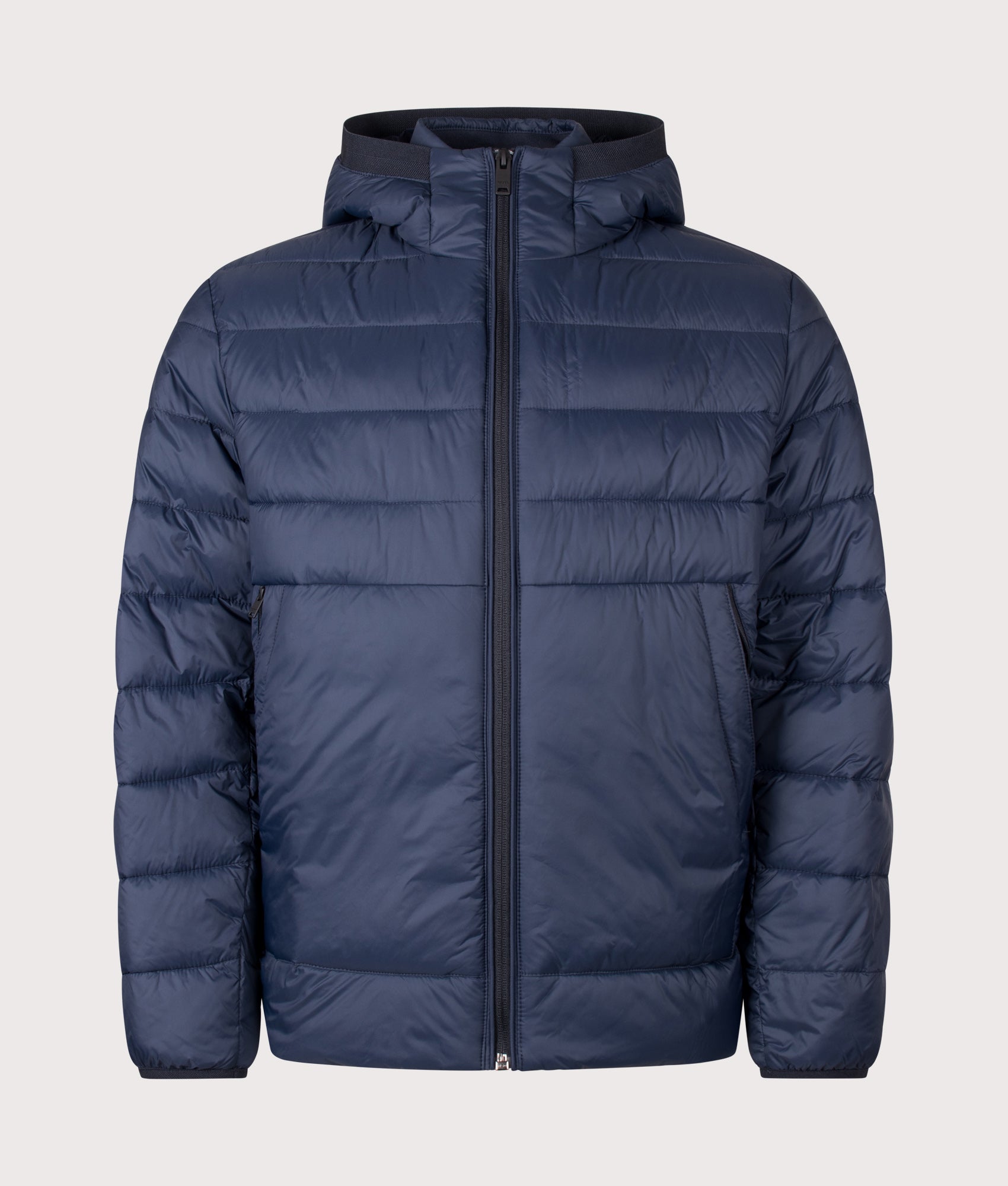 BOSS Regular Fit Odenni Puffer Jacket in Dark Blue at EQVVS Menswear. Front shot.