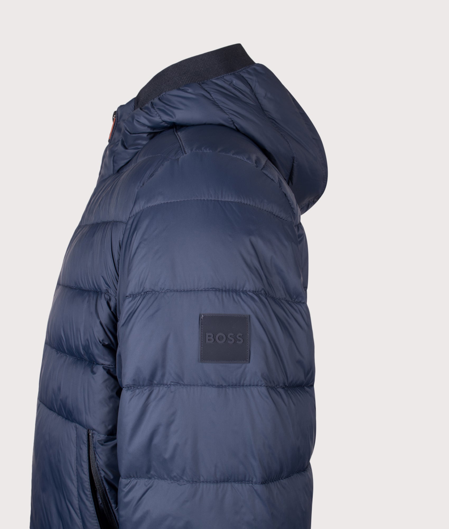 BOSS Regular Fit Odenni Puffer Jacket in Dark Blue at EQVVS Menswear. Detail shot.