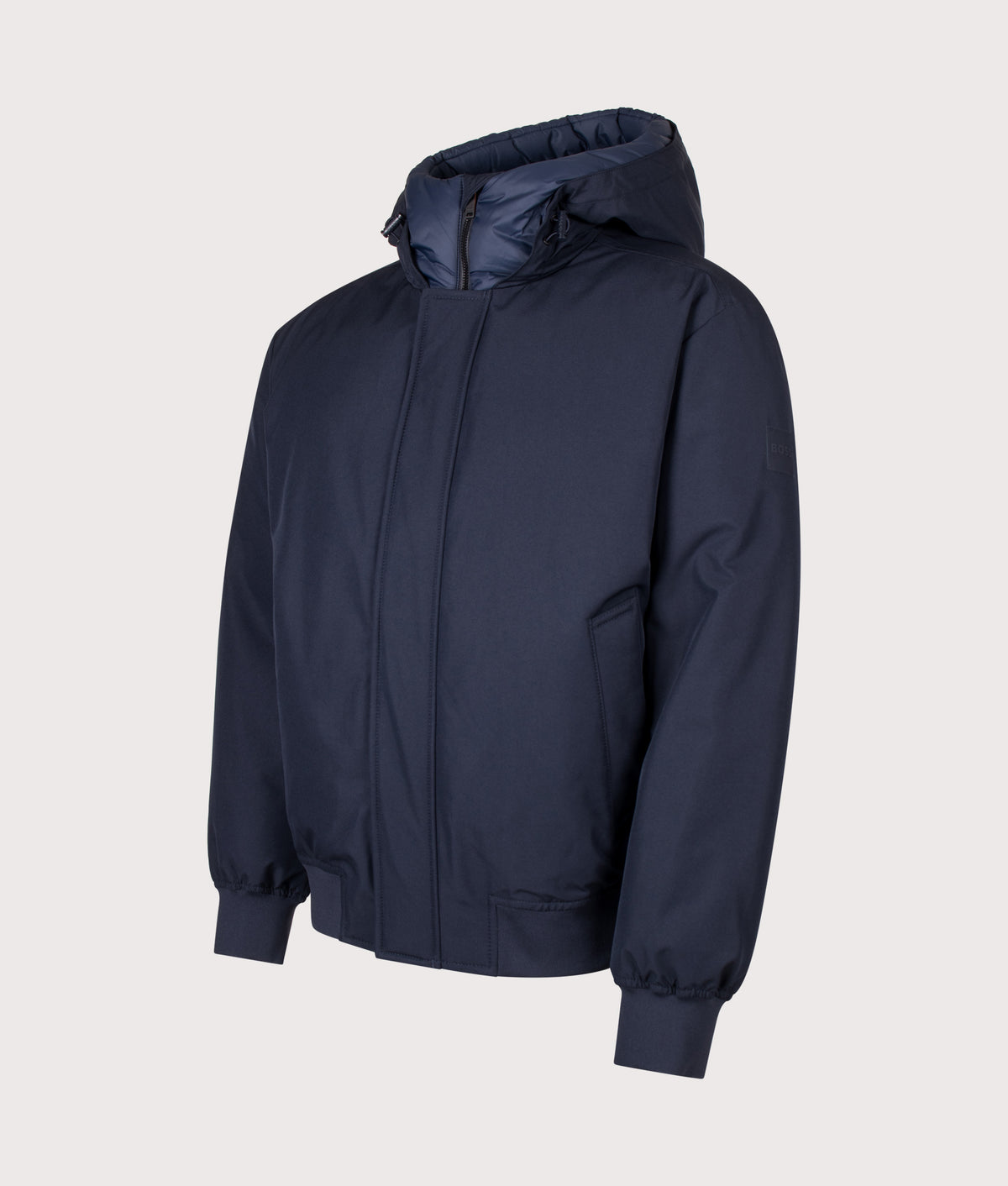 BOSS Regular Fit Osis1 Jacket in Dark Blue at EQVVS Menswear. Angled front shot.