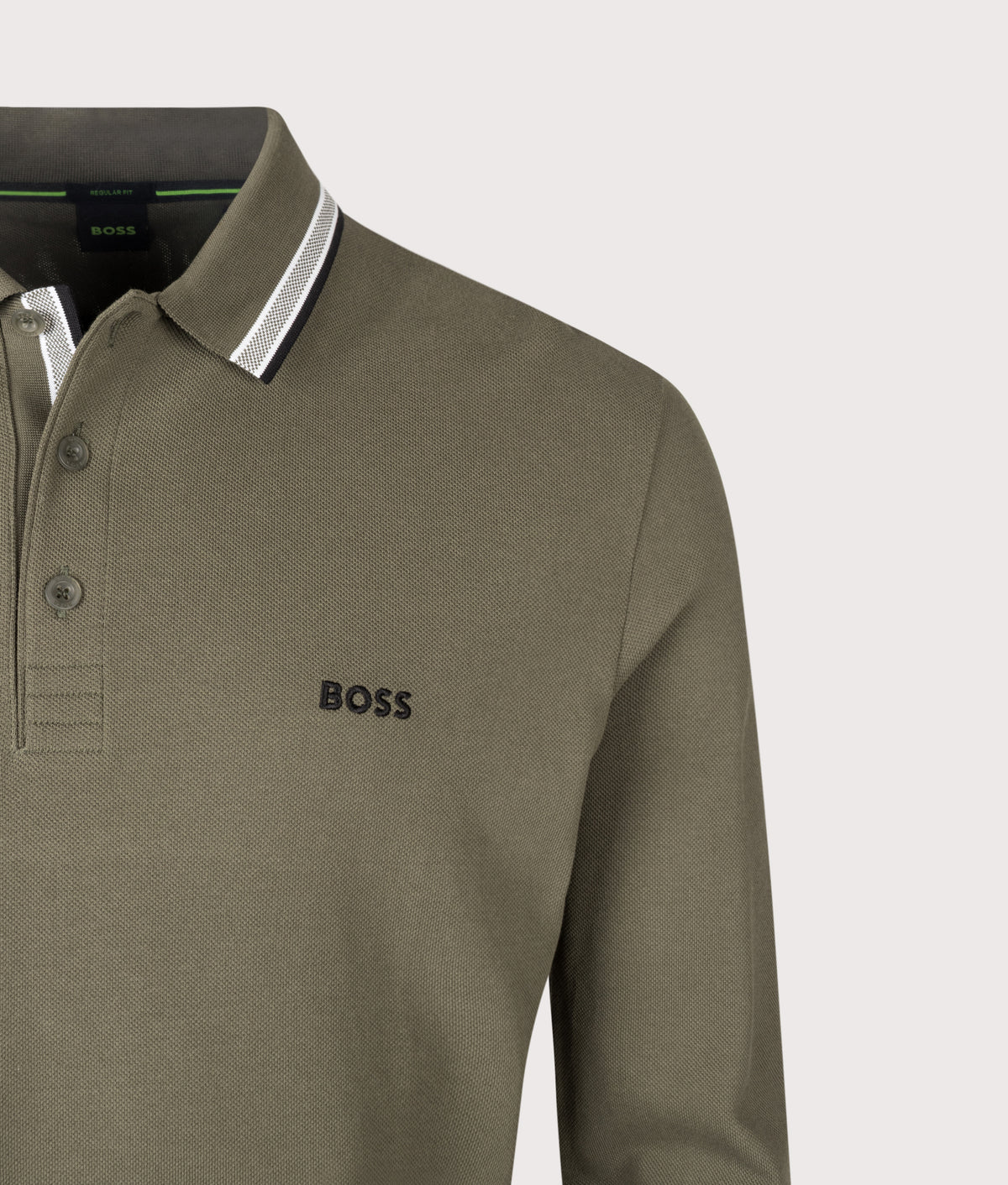 BOSS Regular Fit Plisy Long Sleeve Polo Shirt in Open Green at EQVVS Menswear. Detail shot.