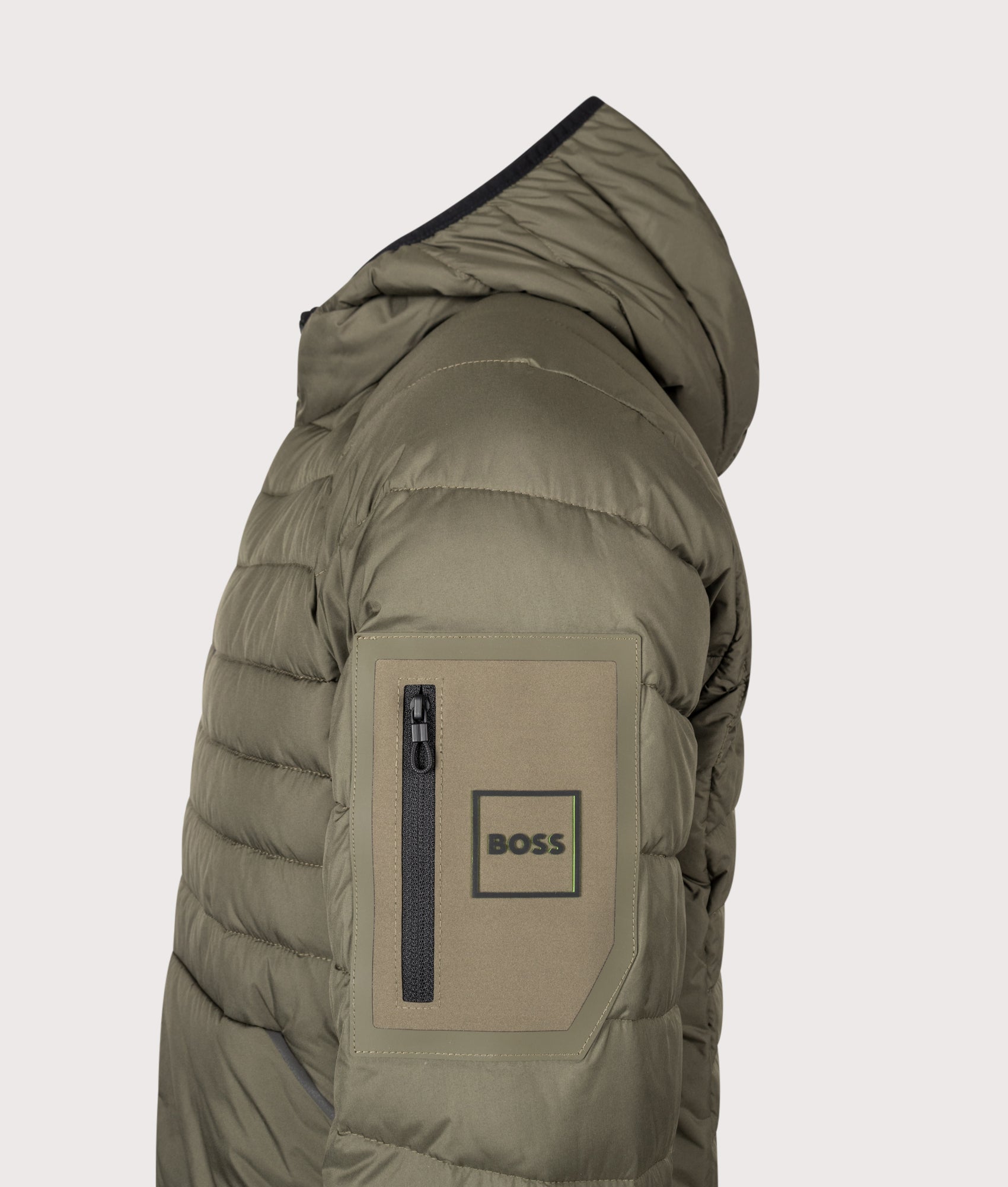BOSS Regular Fit Urbanex Hooded Jacket in open green at EQVVS Menswear. Detail shot.