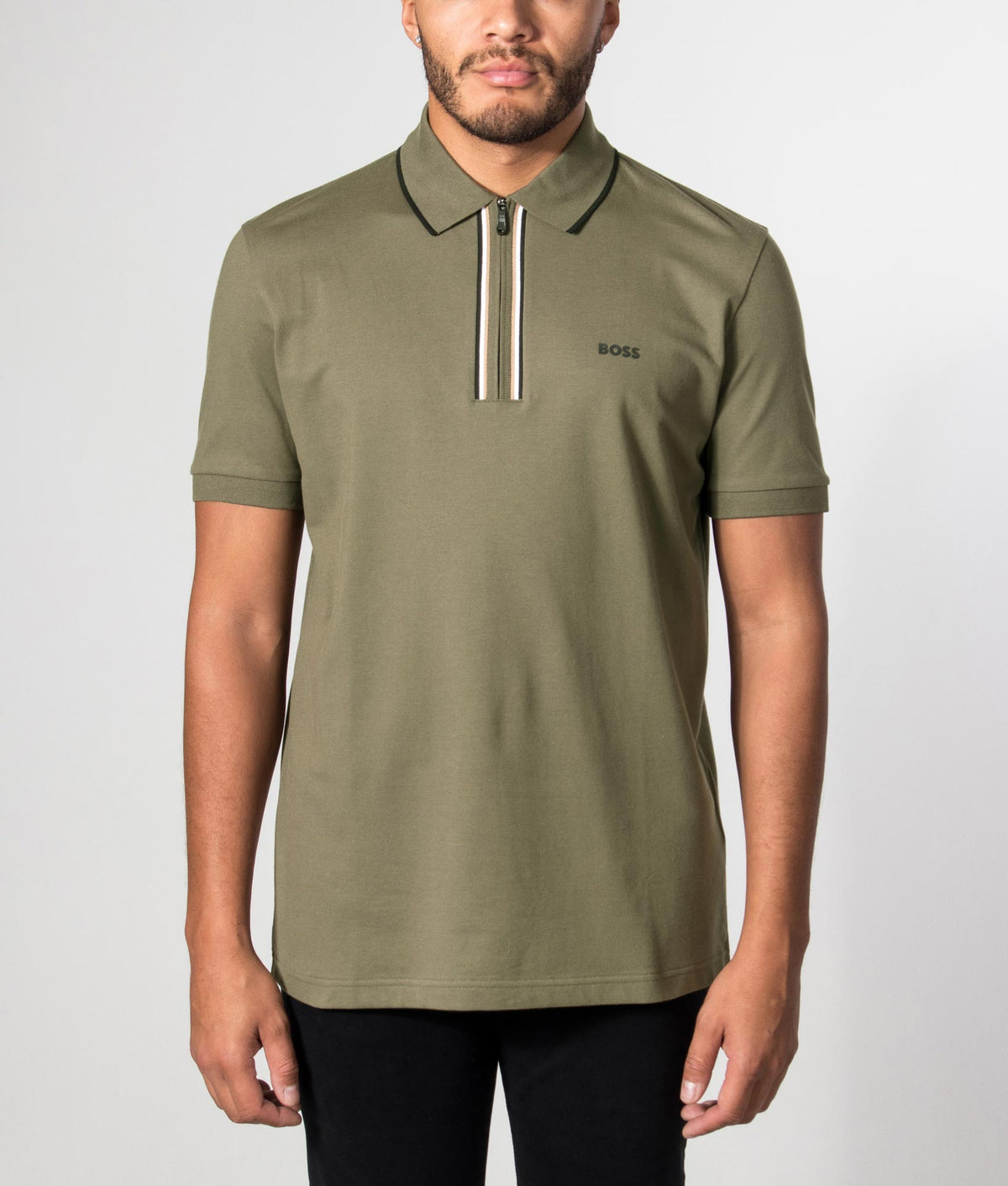 BOSS Slim Fit Philix Polo Shirt in Open Green at EQVVS Menswear. Front model shot.