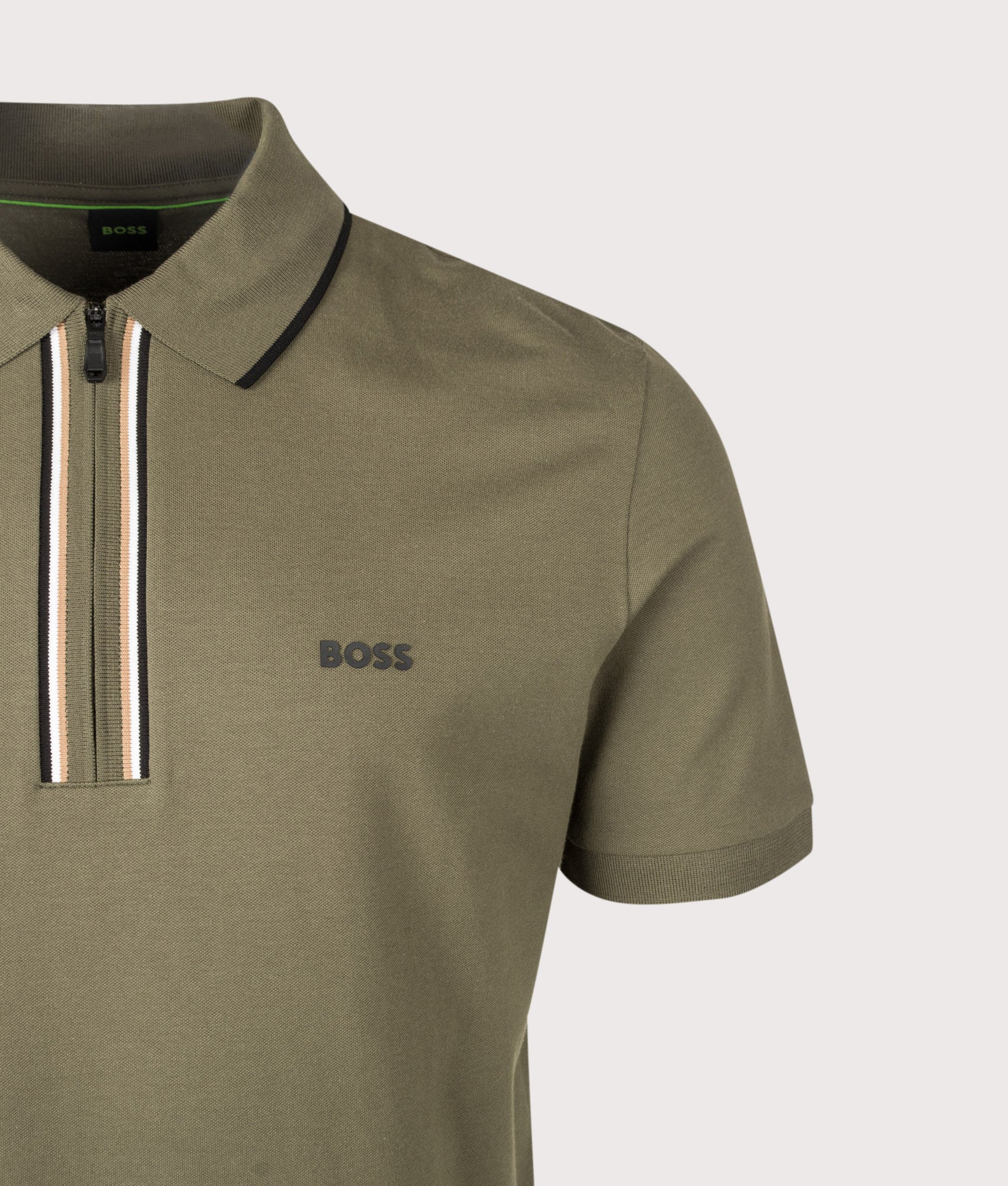 BOSS Slim Fit Philix Polo Shirt in Open Green at EQVVS Menswear. Detail shot.