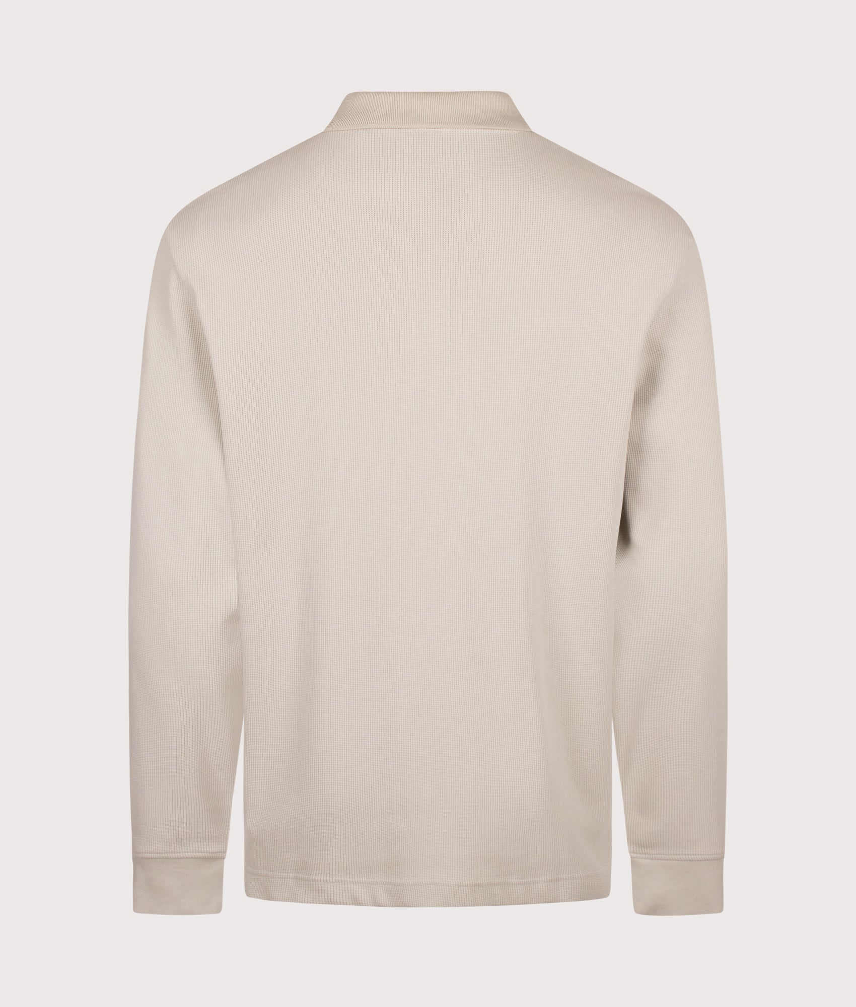 BOSS Regular Fit Petempestolong 1 Long Sleeve Polo Shirt in Light Beige at EQVVS Menswear. Detail shot.