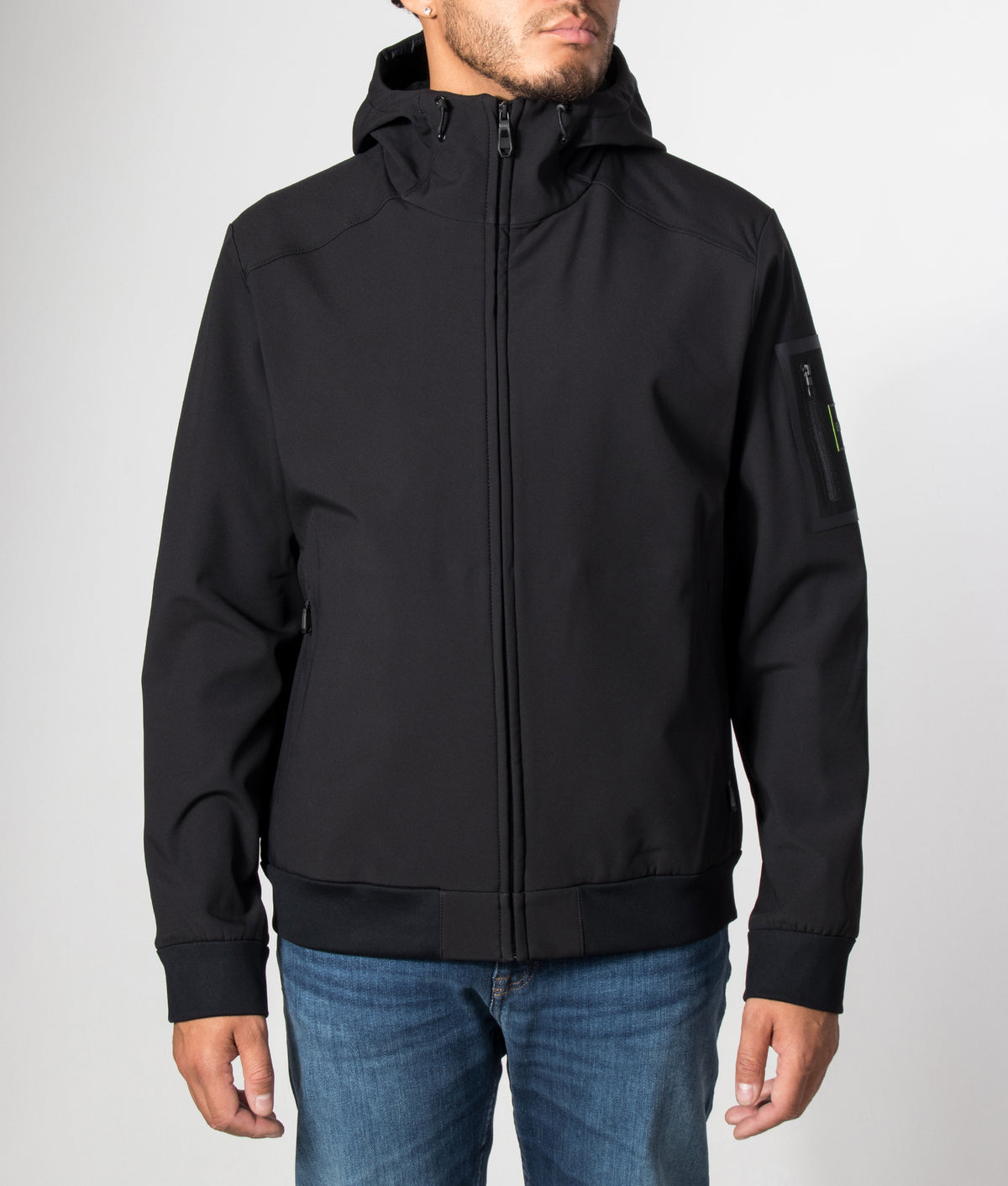 BOSS Regular Fit OW Travel Hooded Jacket in Black at EQVVS Menswear. Model front shot.
