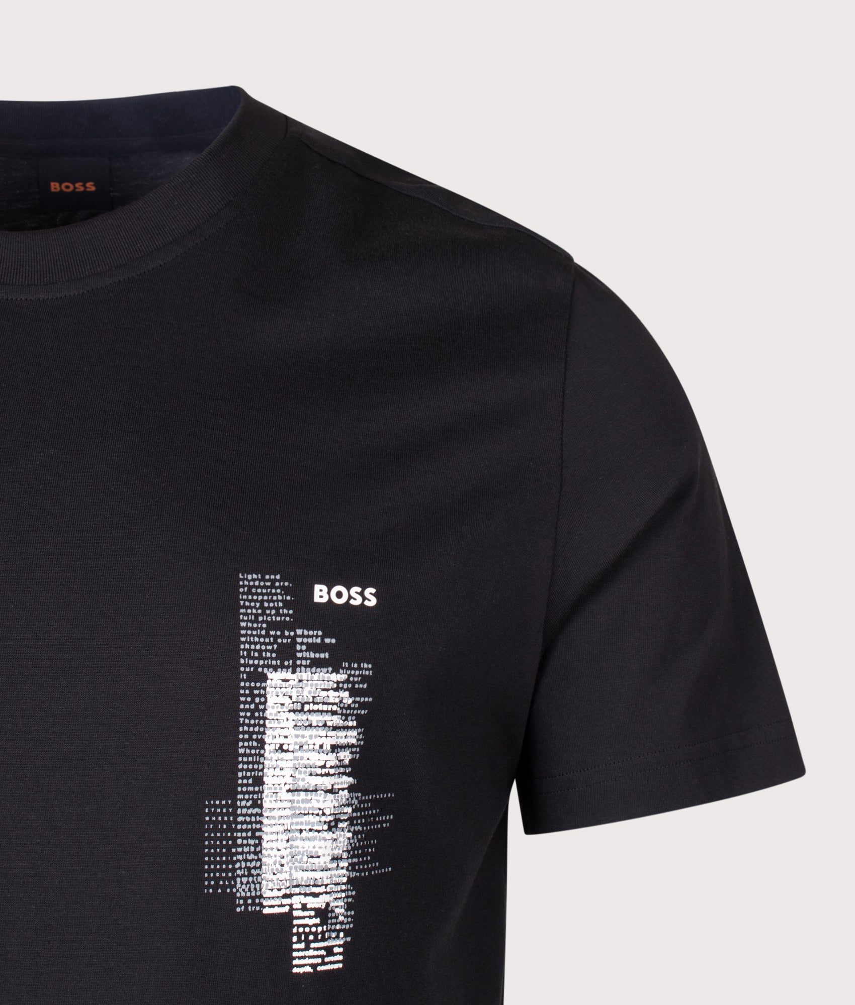 BOSS Regular Fit Te Footprint T-Shirt in Black at EQVVS Menswear. Detail shot.