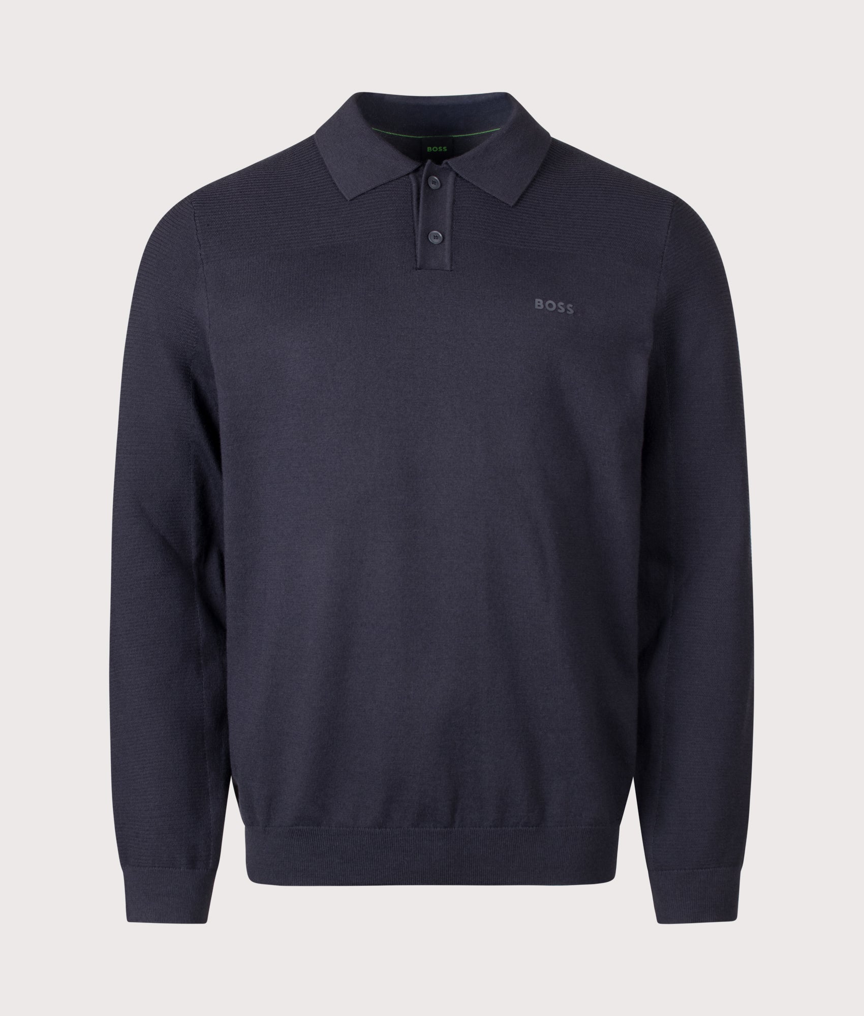 BOSS Regular Fit Long Sleeve Momentum X Knitted Polo Shirt in Dark Blue at EQVVS Menswear. Front shot.