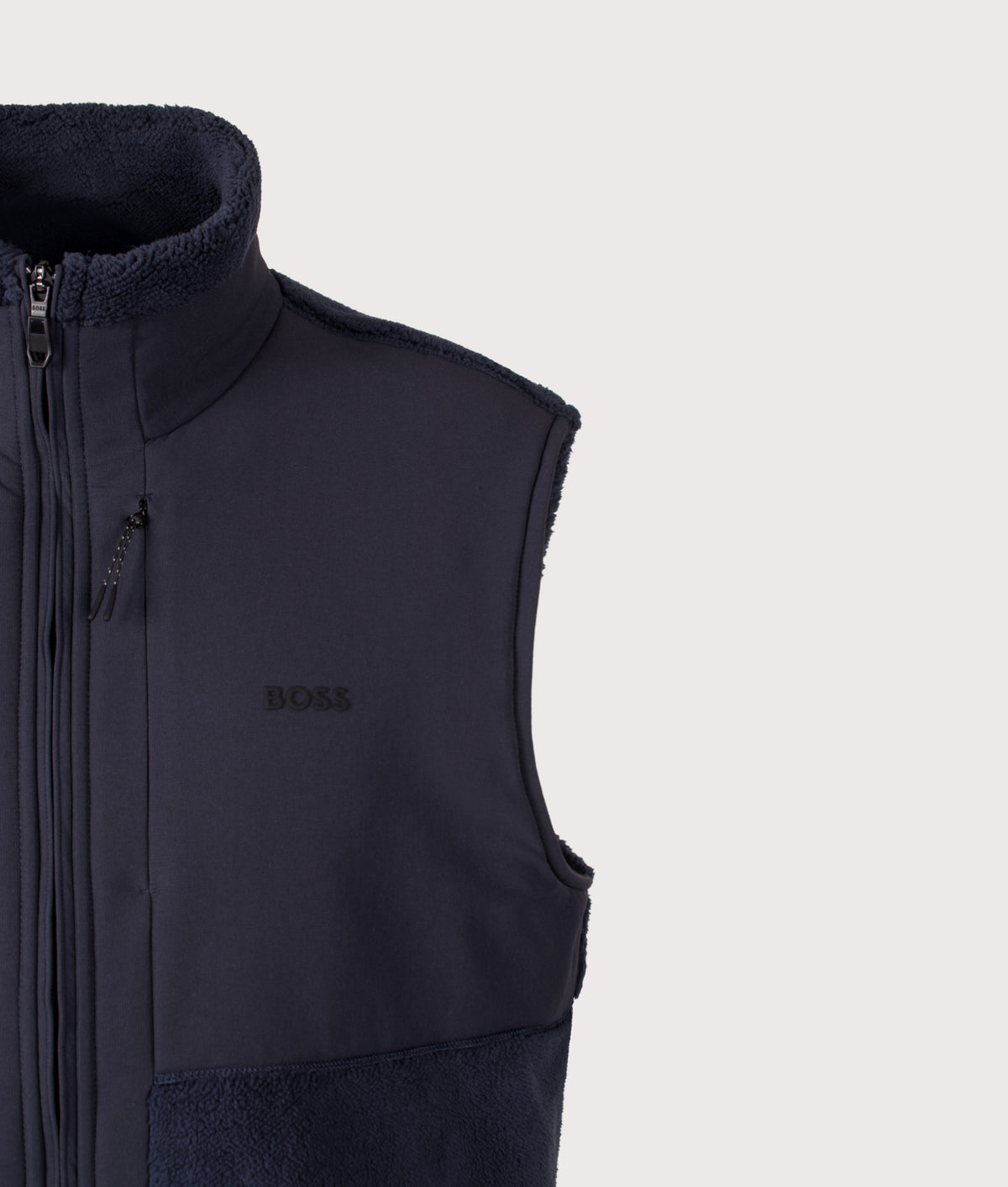 BOSS Relaxed Fit SW Sveedy Vest in Dark Blue at EQVVS Menswear. Detail shot.