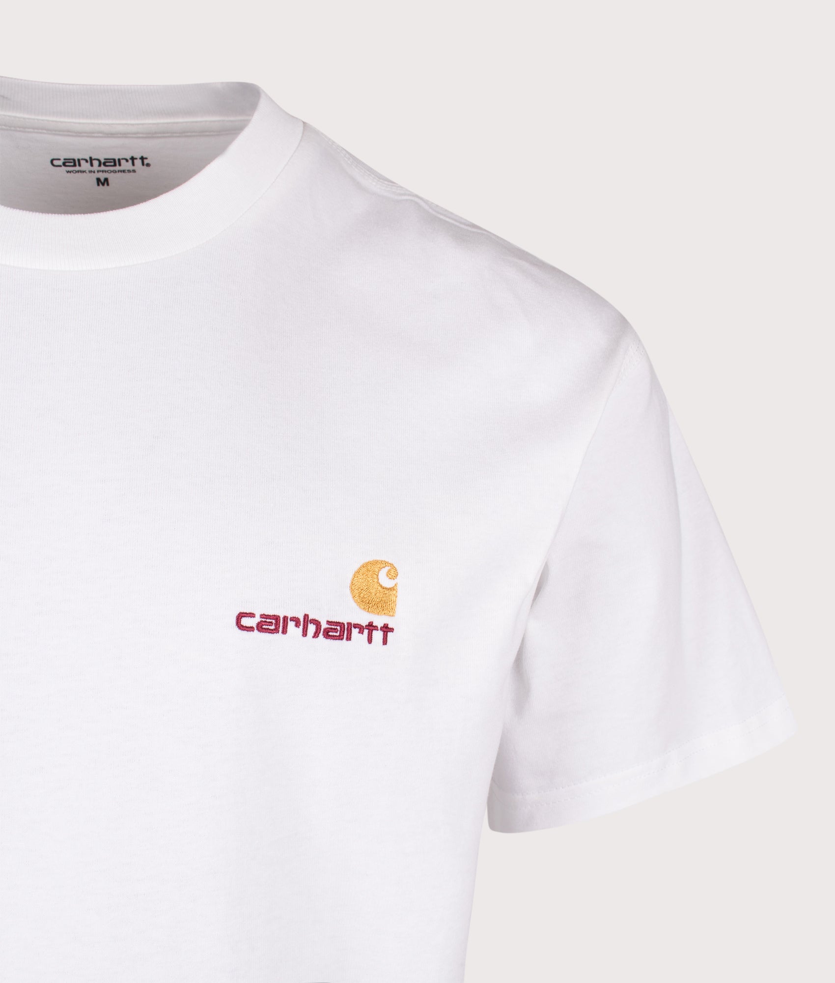 Carhartt WIP Loose Fit American Script T-Shirt in White at EQVVS Menswear. Detail shot.