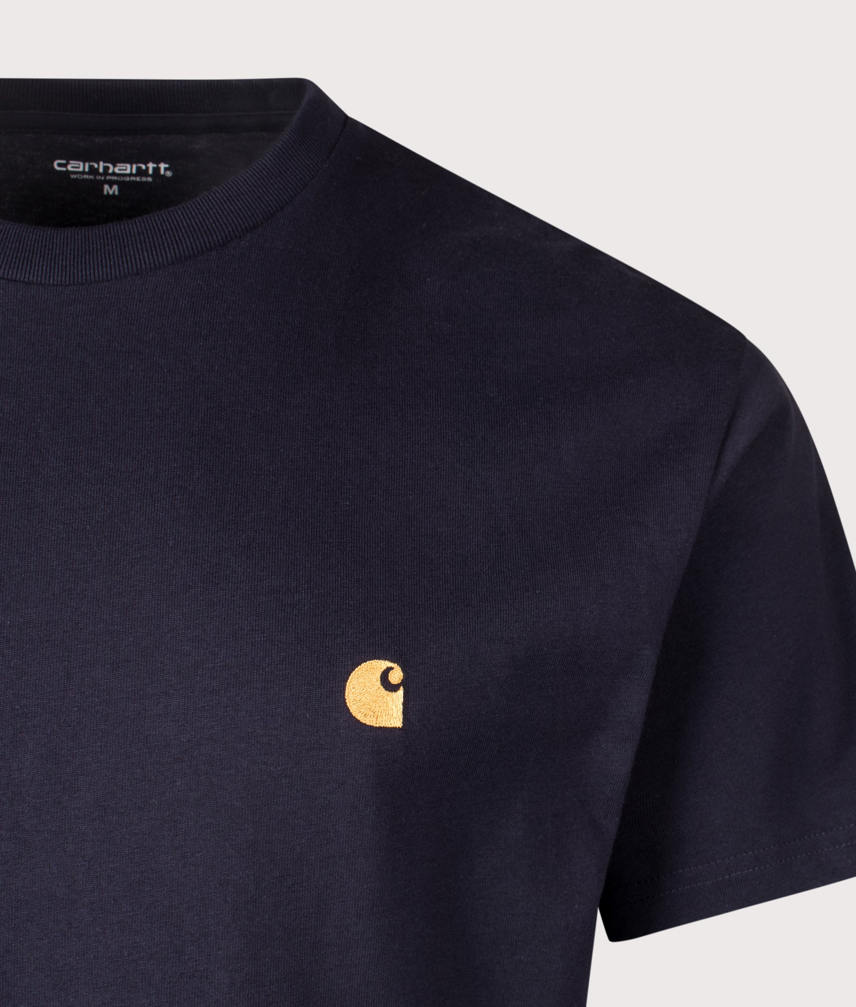 Carhartt WIP Loose Fit Chase T-Shirt in Dark Navy at EQVVS Menswear. Detail shot.