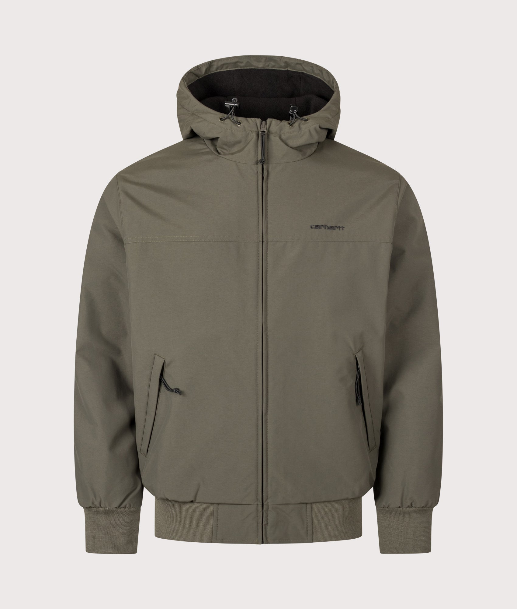 Carhartt WIP Regular Fit Hooded Sail Jacket in Cypress and Black at EQVVS Menswear. Front shot.