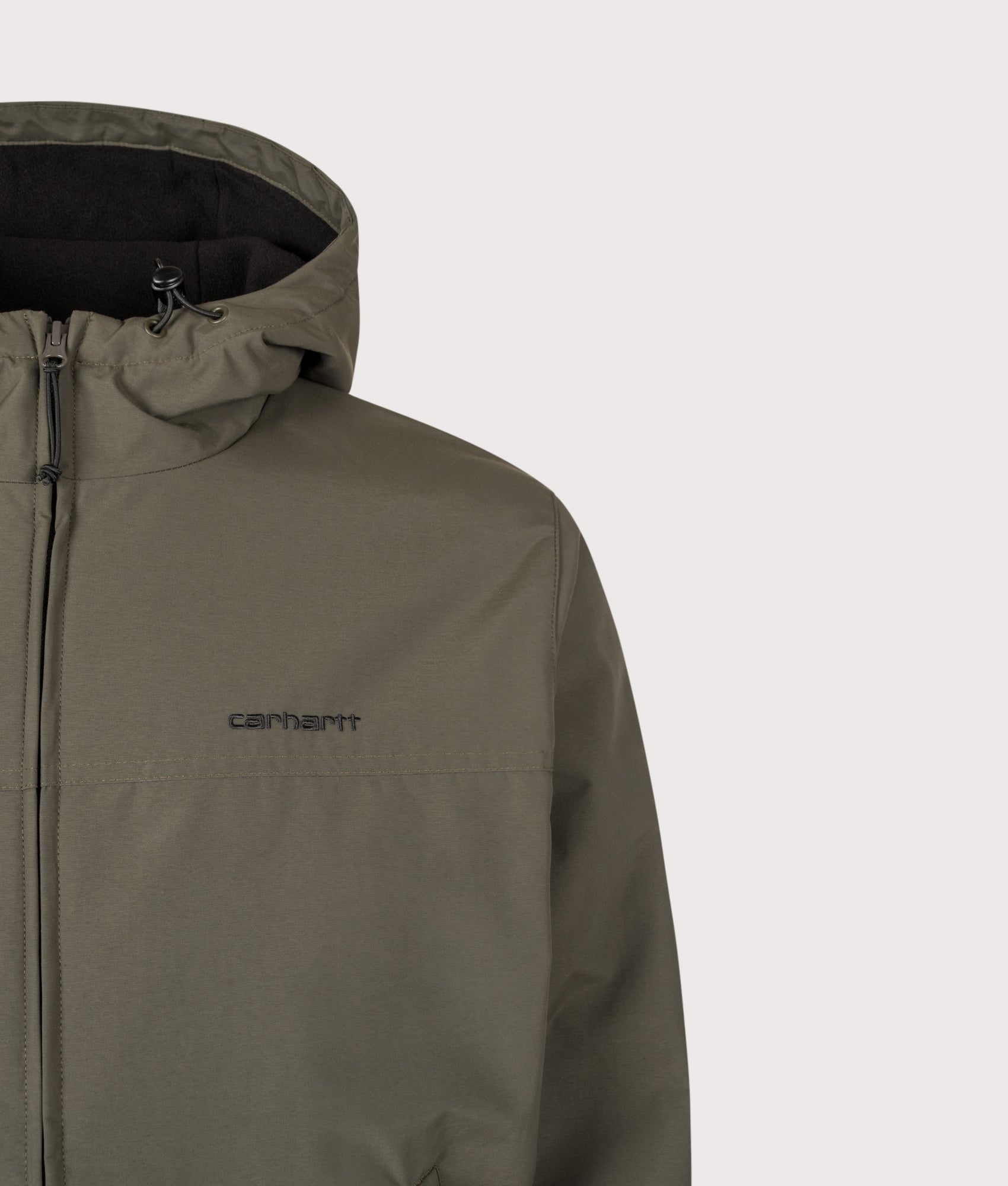 Carhartt WIP Regular Fit Hooded Sail Jacket in Cypress and Black at EQVVS Menswear. Detail shot.