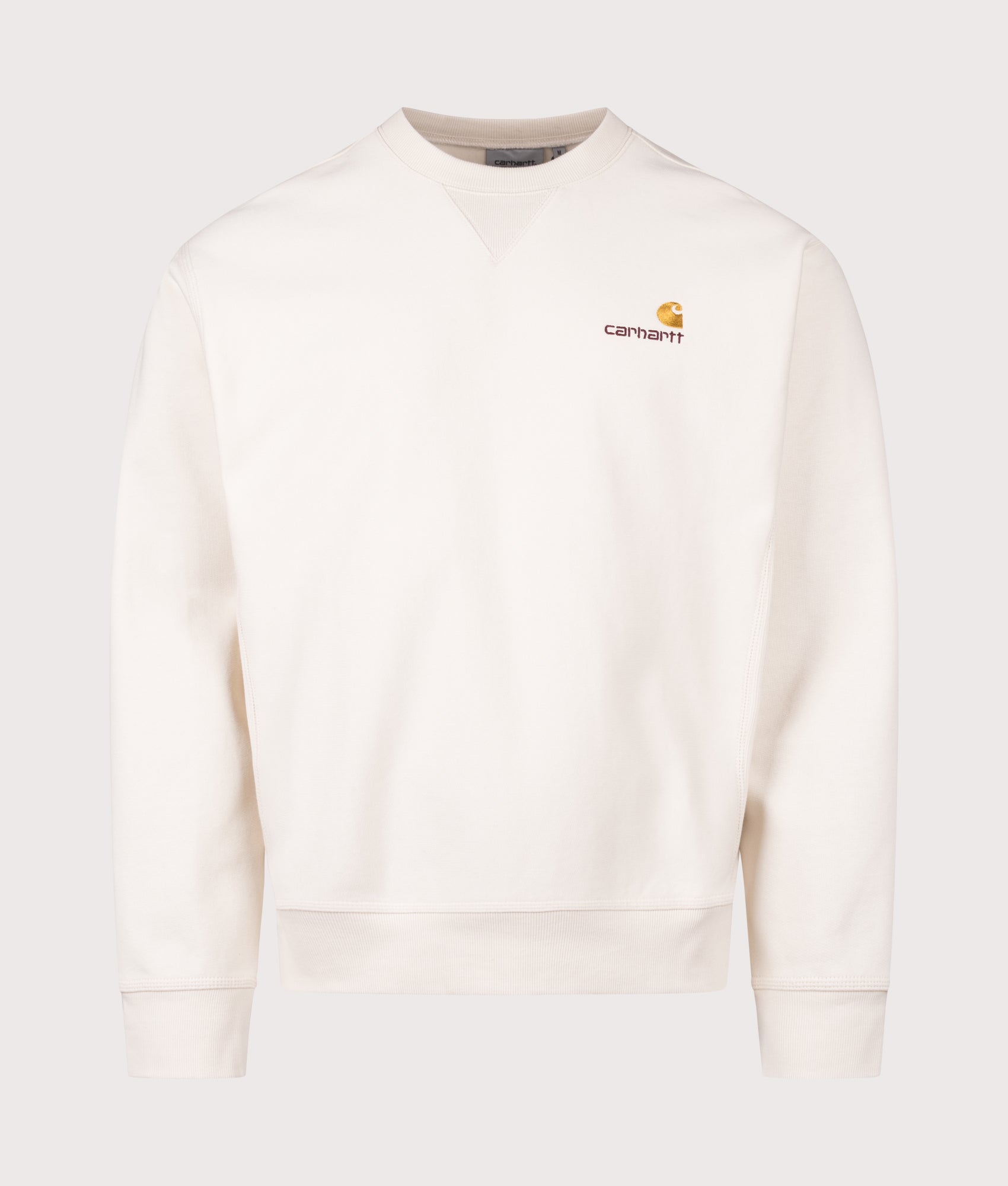 Carhartt WIP staple, the Relaxed Fit American Script Sweatshirt in Natural at EQVVS Menswear. Front shot.