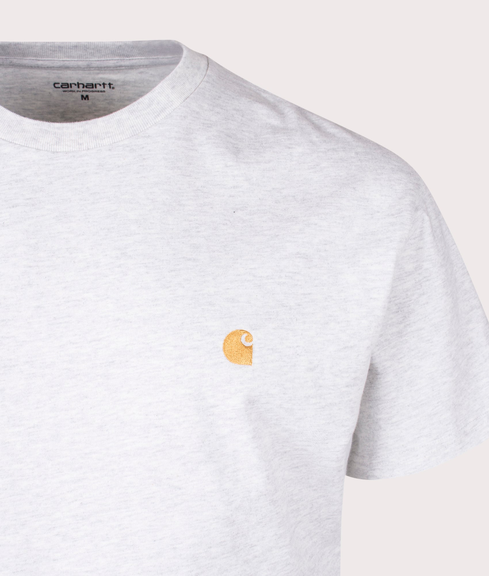 Carhartt WIP Loose Fit Chase T-Shirt in Ash Heather and Gold at EQVVS Menswear. Detail shot. 