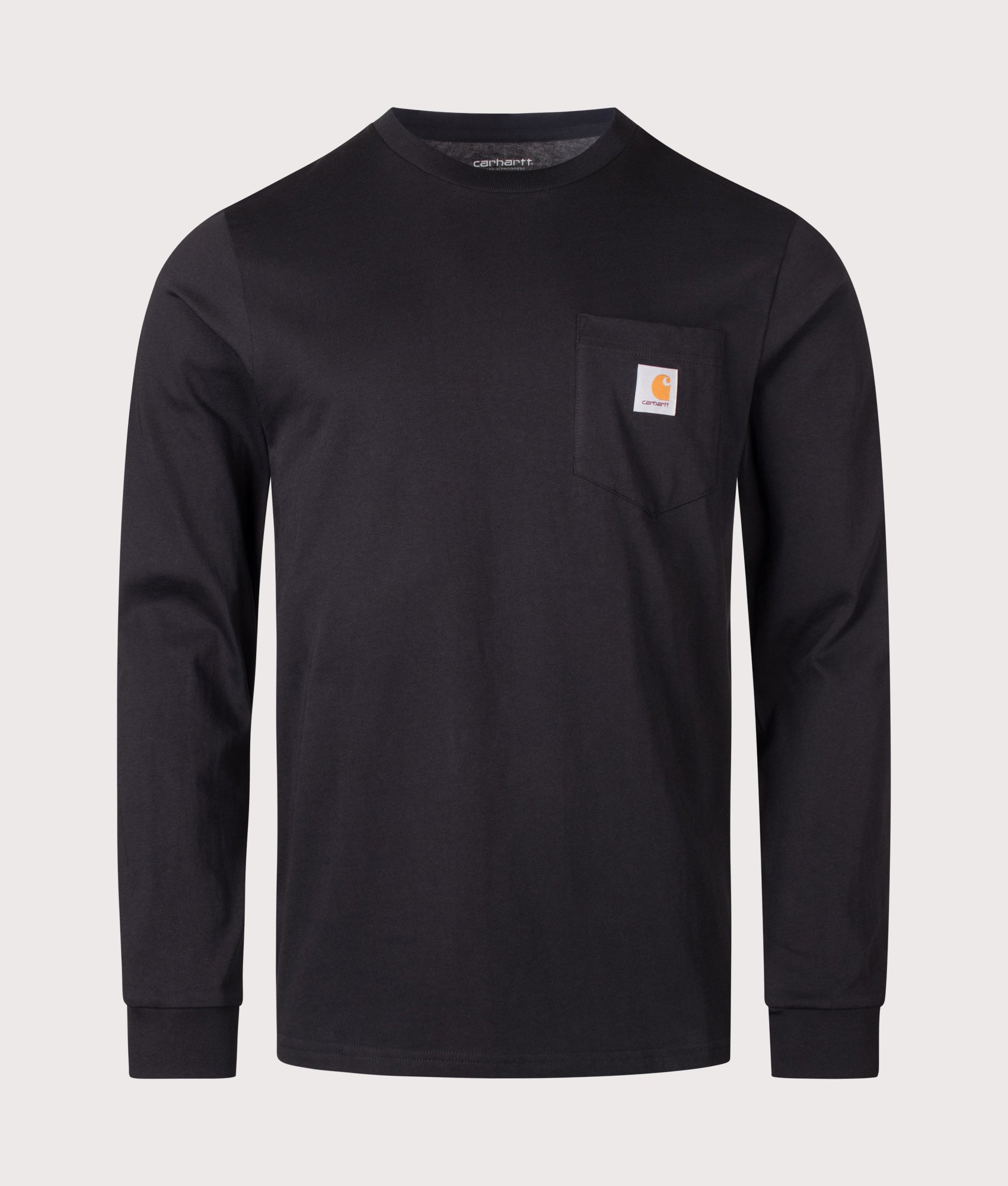 Carhartt WIP Regular Fit Long Sleeve Pocket T-Shirt in Black at EQVVS Menswear. Front shot.
