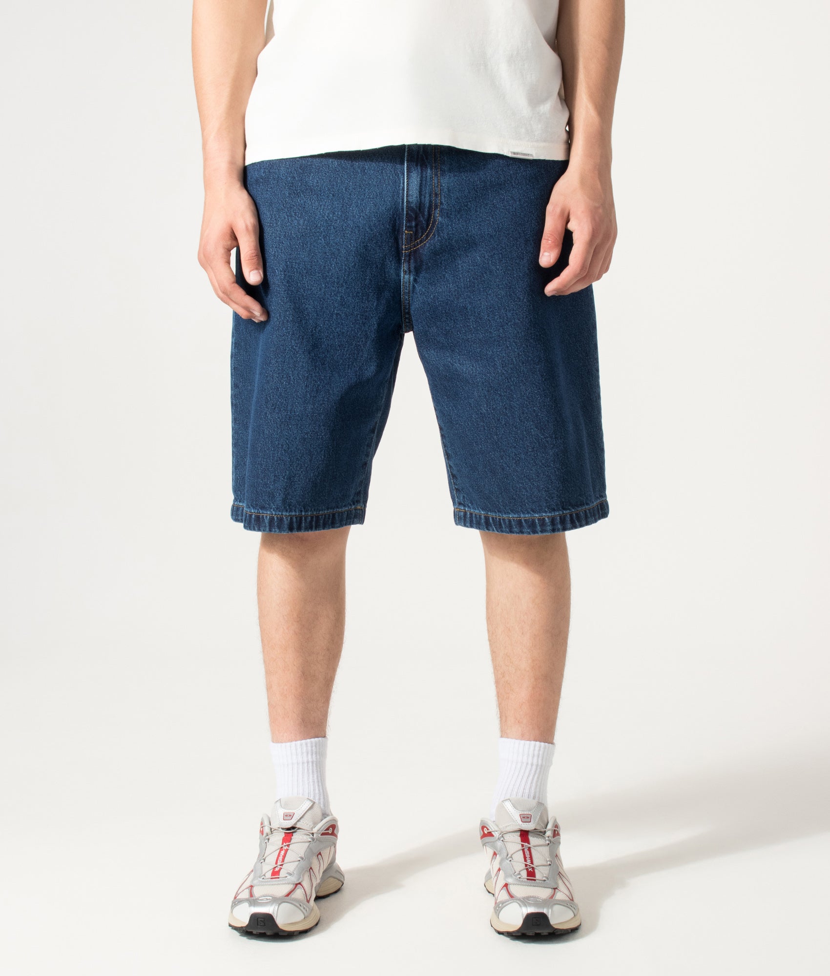 Carhartt WIP Loose Fit Landon Denim Shorts in Blue at EQVVS Menswear. Model front shot.