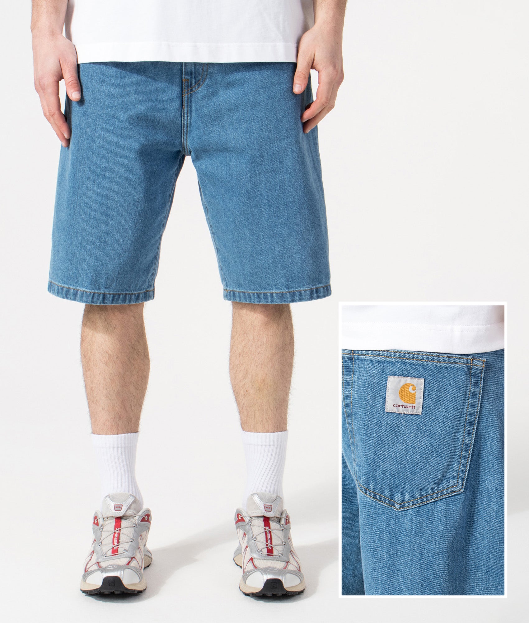 Carhartt WIP Relaxed Fit Landon Shorts in Blue Heavy Stone Wash at EQVVS Menswear. Model front and back shot.