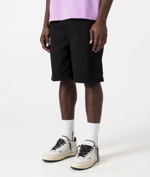 Flint Shorts in Black by Carhartt WIP. EQVVS Side Angle Shot.