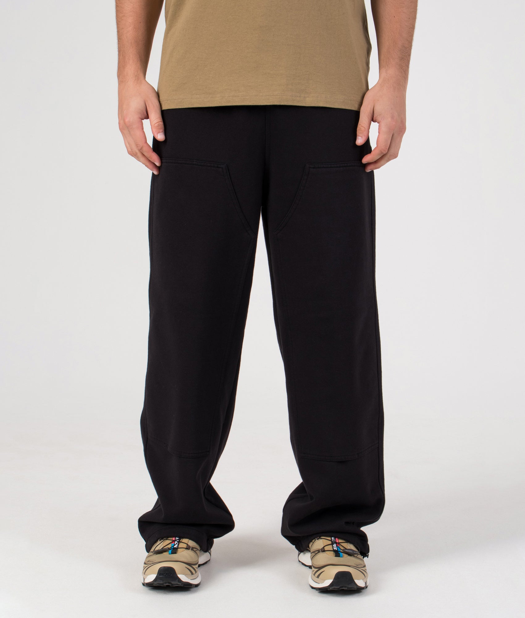 Relaxed Fit Double Knee Sweat Pants in Black | Carhartt WIP | EQVVS | Front model shot 