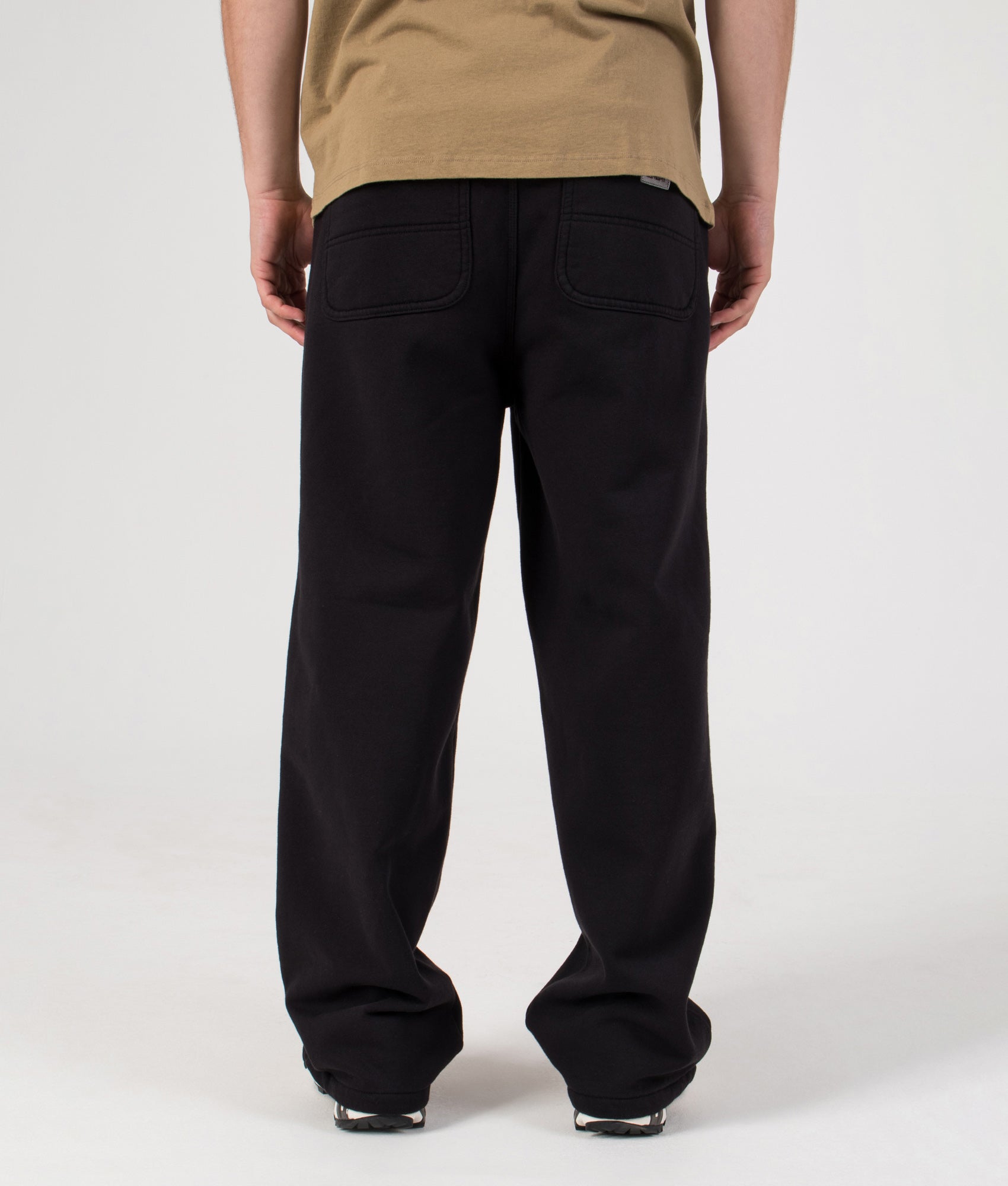 Relaxed Fit Double Knee Sweat Pants in Black | Carhartt WIP | EQVVS | Back model shot 