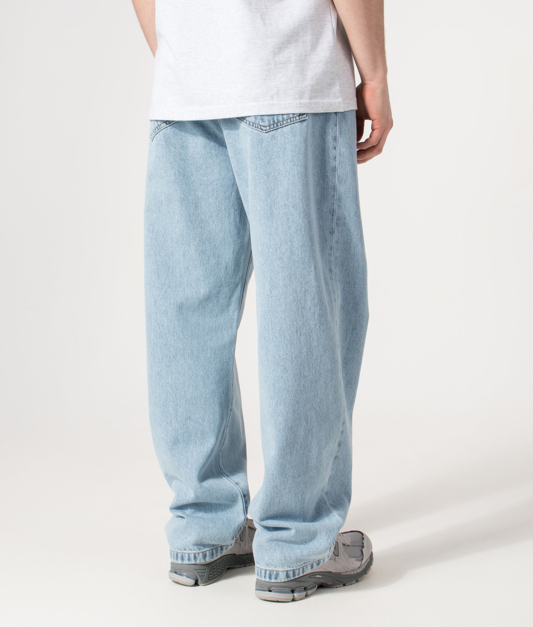 Carhartt WIP Landon Jeans in blue at EQVVS Menswear. Model back shot.