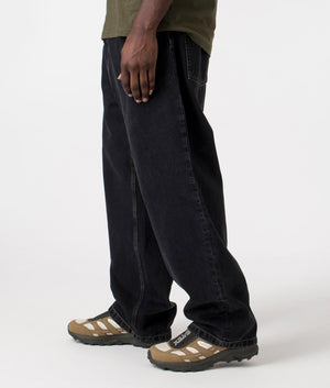 Carhartt WIP Relaxed Fit Brandon Jeans in Black Stone Washed, 100% Cotton Side Shot at EQVVS