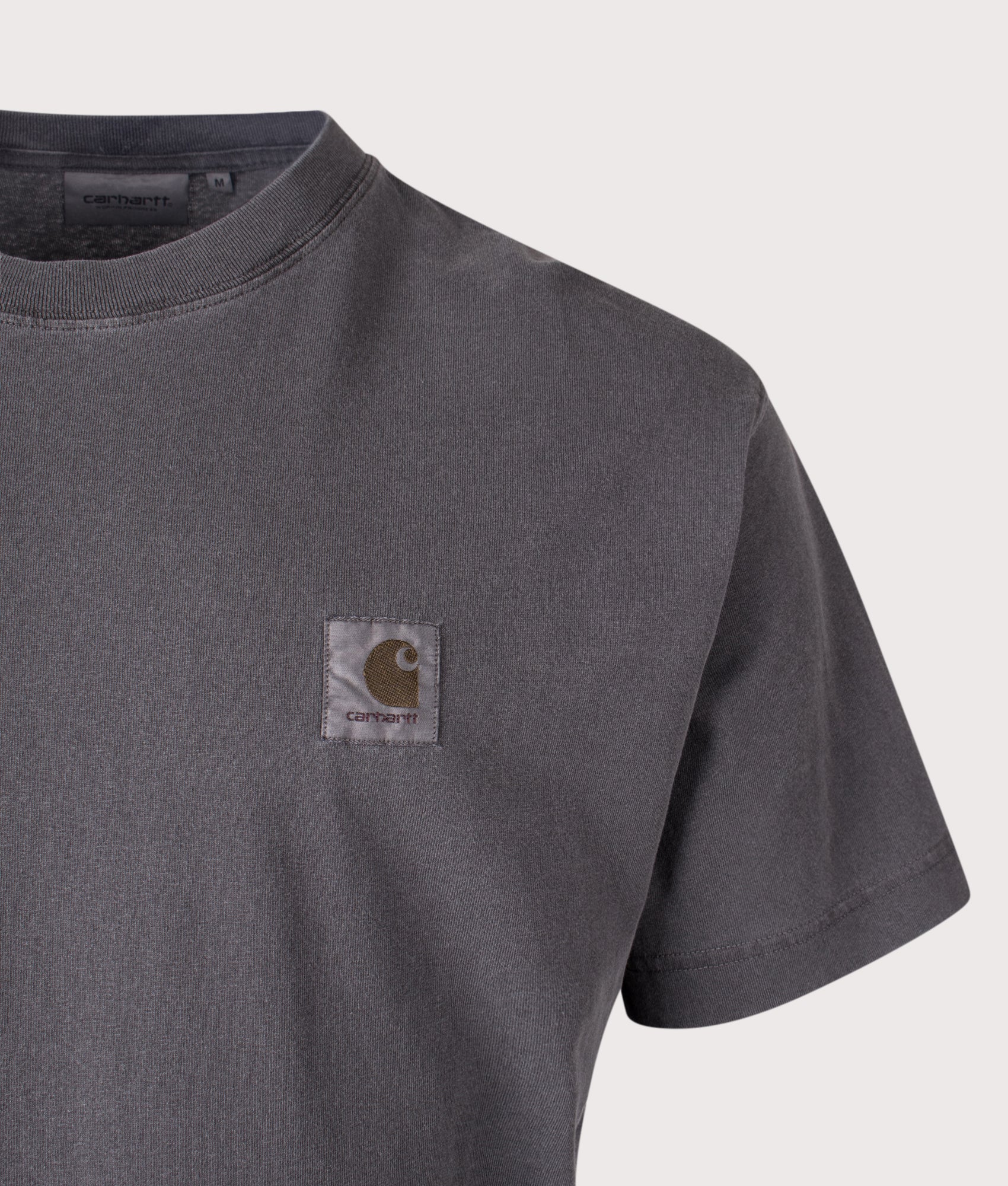 Carhartt WIP Relaxed Fit Nelson T-Shirt in Black at EQVVS Menswear. Detail shot.