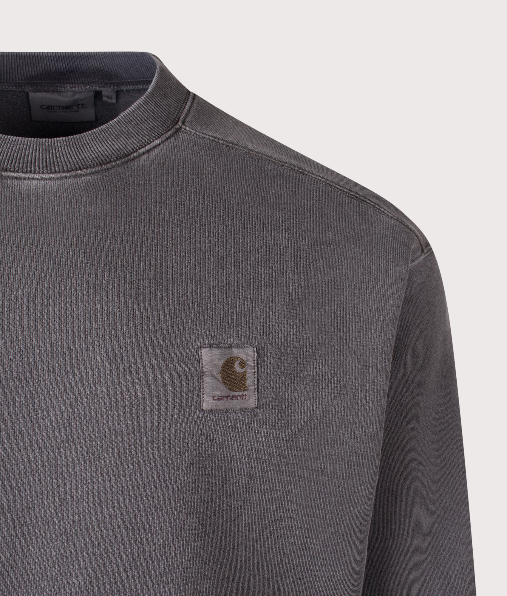 Carhartt WIP Oversized Nelson Sweatshirt in Black at EQVVS Menswear. Detail shot.