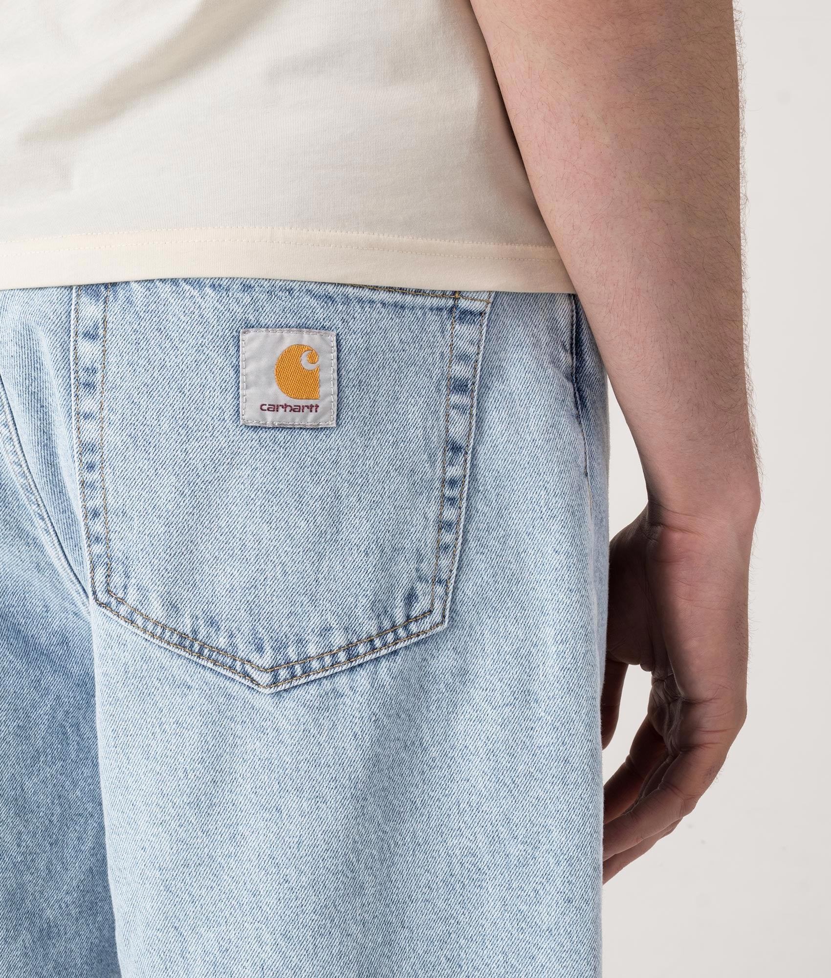 Relaxed Fit Landon Denim Shorts in Blue by Carhartt WIP. Shot by EQVVS. Detail shot.