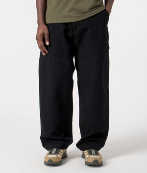 Carhartt WIP Relaxed Fit Wide Panel Pants in Black Rinsed, 100% Cotton Model Front Shot at EQVVS