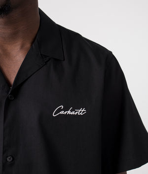 Carhartt WIP Short Sleeve Delray Shirt in Black with Wax Shade Branding on the Chest. Chest Model Shot at EQVVS.