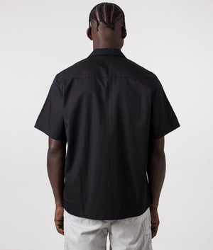 Carhartt WIP Short Sleeve Delray Shirt in Black with Wax Shade Branding on the Chest. Back Model Shot at EQVVS.