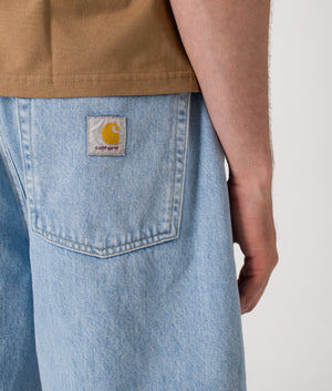 Relaxed Fit Brandon Shorts. Shot by EQVVS. Rear Pocket Detail model shot.
