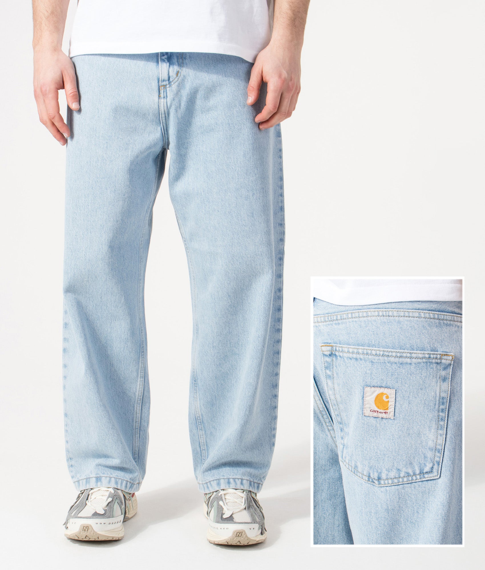 Carhartt WIP Relaxed Fit Brandon Jeans in  Blue Heavy Stone Bleached at EQVVS Menswear. Model front shot and back detail shot.