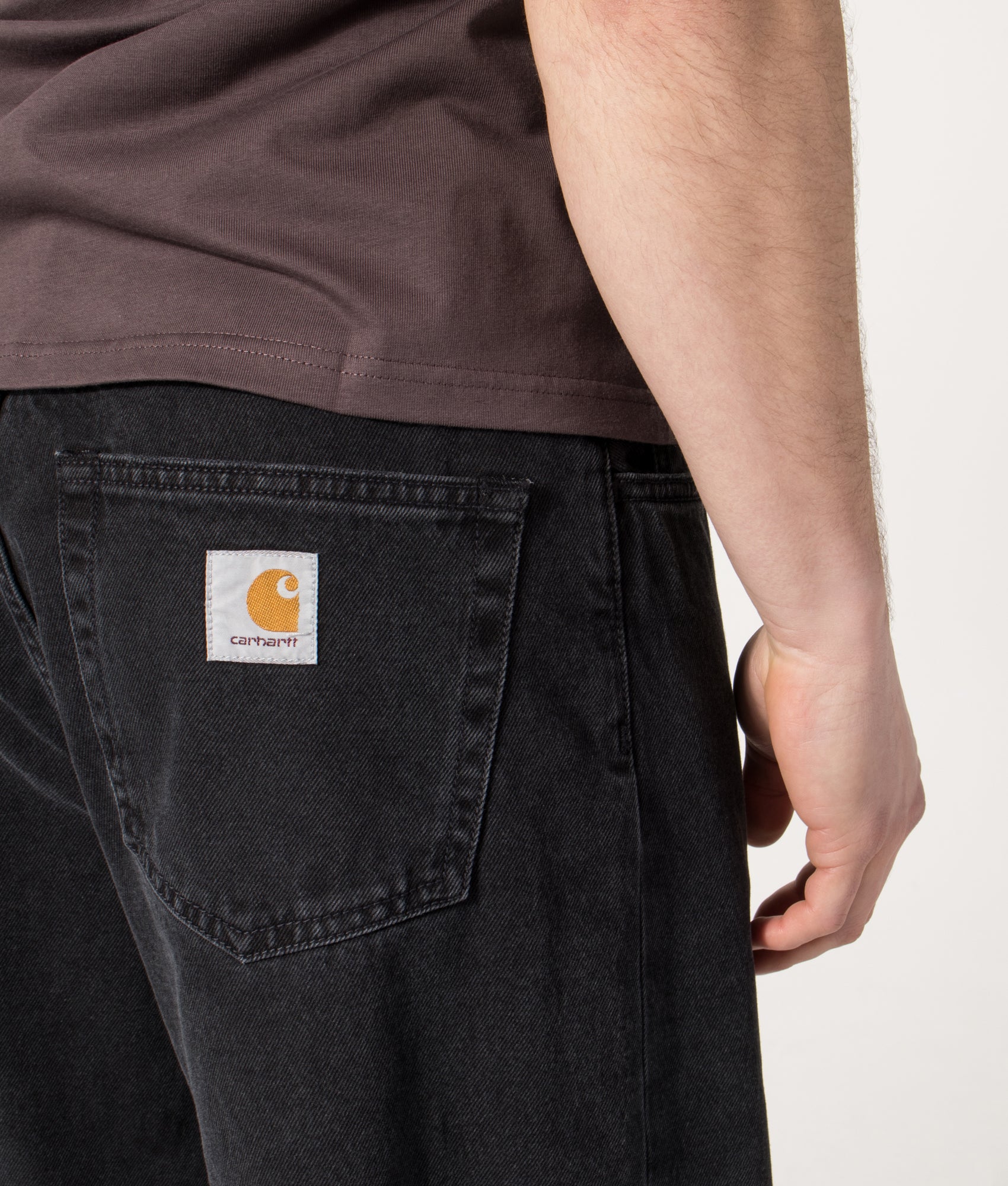 Carhartt WIP Landon Jeans in Black Stone Washed at EQVVS Menswear. Back detail shot.