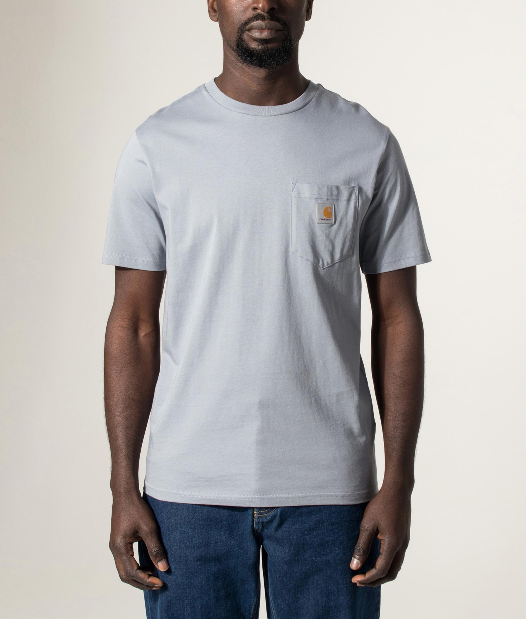Carhartt WIP Pocket T-Shirt in Mirror at EQVVS Menswear. Model front shot.