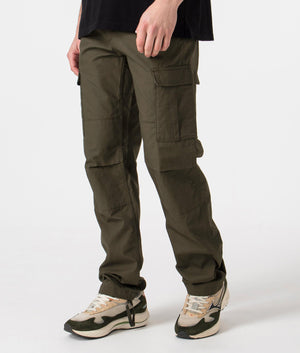 Carhartt WIP Regular Fit Aviation Pants in Cypress Green Angle Shot at EQVVS Menswear