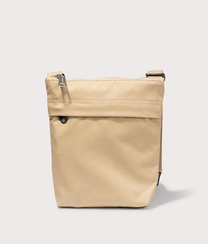 Carhartt WIP Newhaven Shoulder Bag in Sable. Front angle shot at EQVVS.