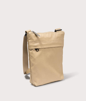Carhartt WIP Newhaven Shoulder Bag in Sable. Side angle shot at EQVVS.