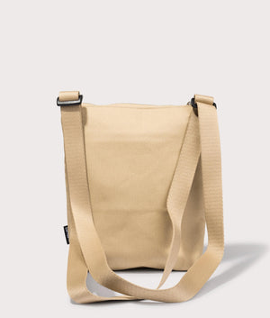 Carhartt WIP Newhaven Shoulder Bag in Sable. Back angle shot at EQVVS.