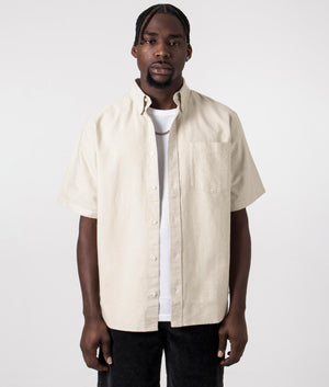 Carhartt WIP Short Sleeve Braxton Shirt in Agate Beige with Wax Branding, 100 % Cotton. Front Model Shot Open at EQVVS 