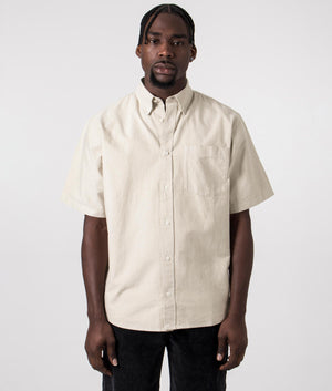 Carhartt WIP Short Sleeve Braxton Shirt in Agate Beige with Wax Branding, 100 % Cotton. Front Model Shot at EQVVS 