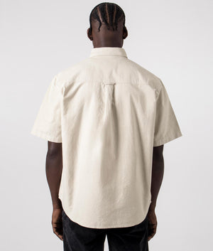 Carhartt WIP Short Sleeve Braxton Shirt in Agate Beige with Wax Branding, 100 % Cotton. Back Model Shot at EQVVS 
