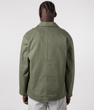 Carhartt WIP Midland Blazer in Dollar Green, 100% Cotton. Back Model Shot at EQVVS.