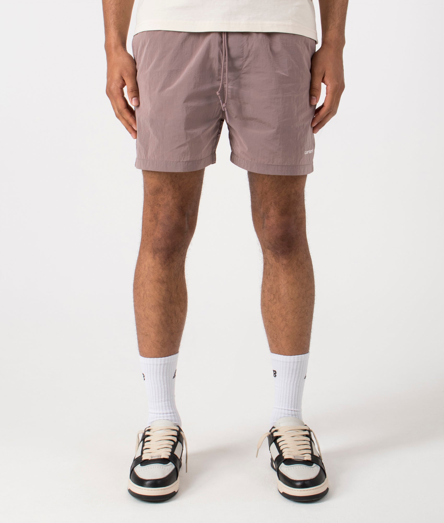 Tobes Swim Trunks in Glassy Pink by Carhartt WIP. EQVVS Front Angle Shot.